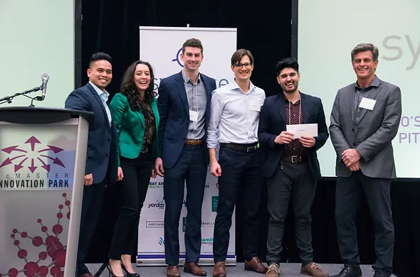 Epineuron Technologies, winners of the 2019 Life Science Pitch Competition, being presented a cheque