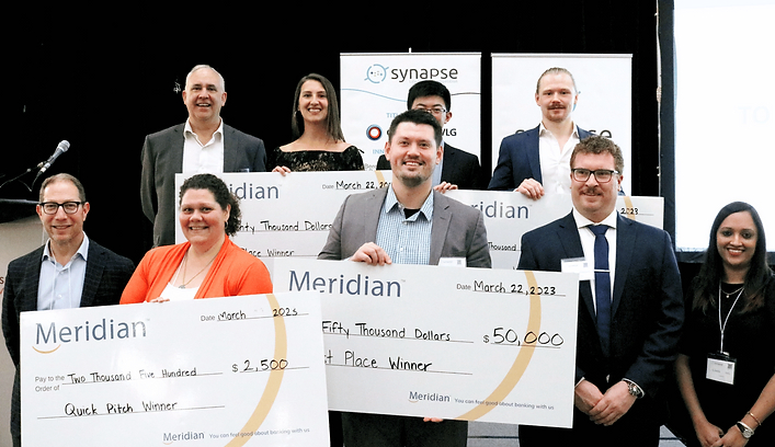 Winners of the 2023 Life Science Pitch Competition being presented a cheque